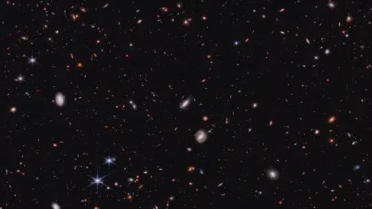 The James Webb Space Telescope discovers galaxies that suggest an alternative to dark matter.
 