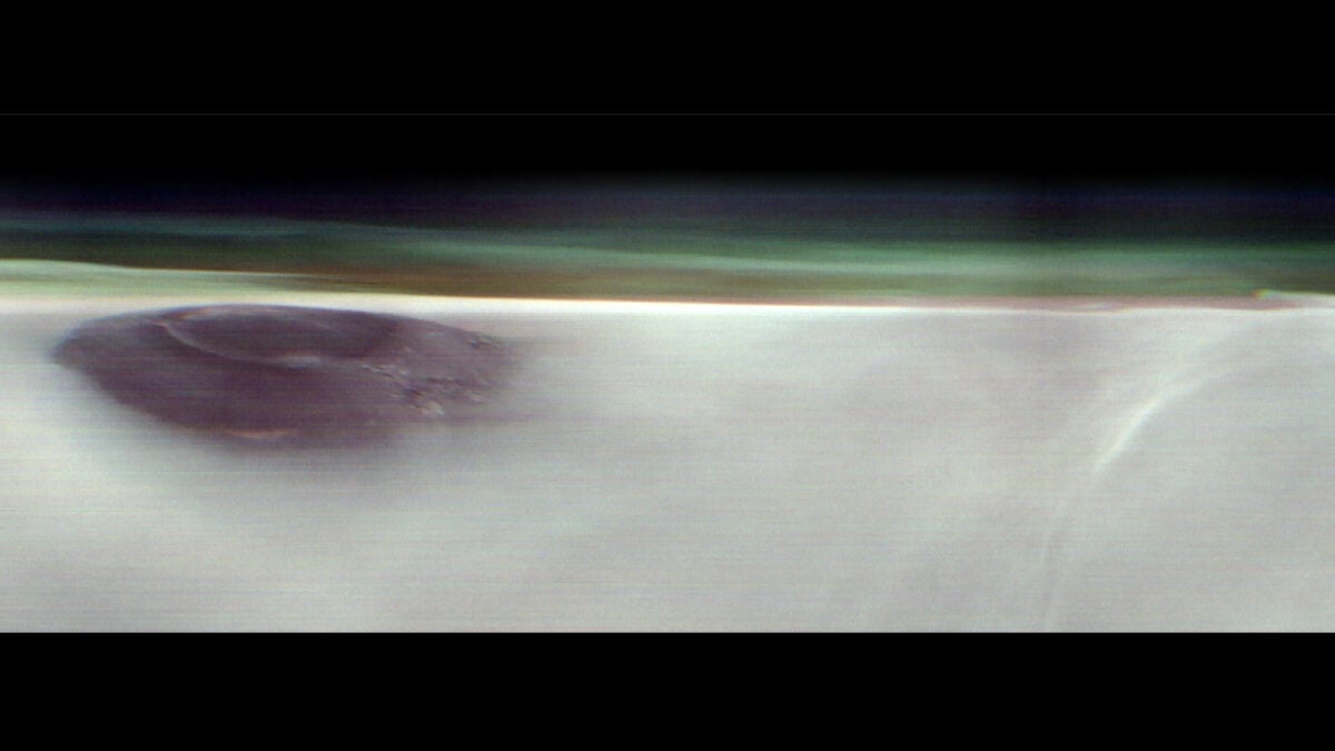 ​Mars Orbiter Sees Uncommon Image of an Ancient Volcano Emerging Above the Clouds
 